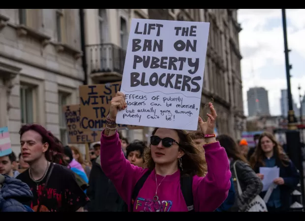 Ex-health secretary's personal beliefs led to ban on puberty blockers.