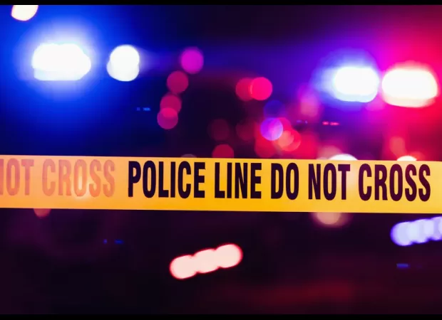 A woman was hit by bullets during a confrontation with two police officers.