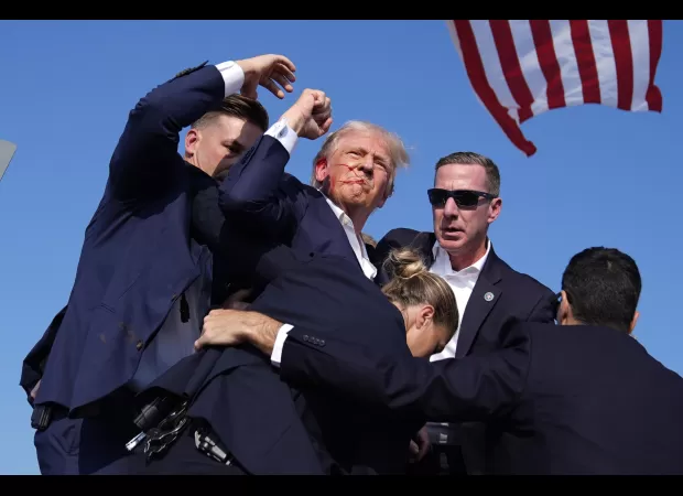 Trump injured in shooting at political event