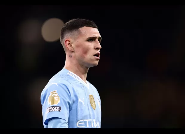 Phil Foden honors a special person with 47 tattooed on his neck, showing his love and respect.