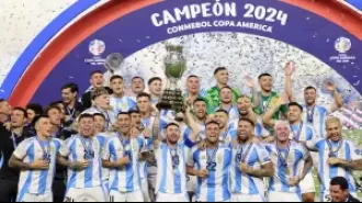 Argentina breaks Copa America record, defeats Colombia 1-0 despite Messi injury.