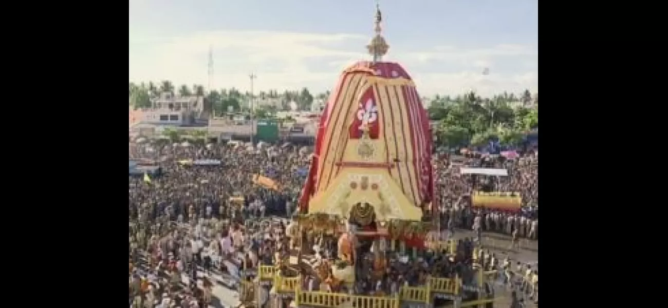 Crowds of people in Puri participate in the annual car festival, pulling chariots to welcome Lord Jagannath's return.
