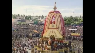 Crowds of people in Puri participate in the annual car festival, pulling chariots to welcome Lord Jagannath's return.