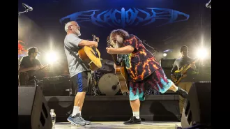 Famous American rock group delays performance at the last minute due to controversy surrounding a comment about shooting Donald Trump.