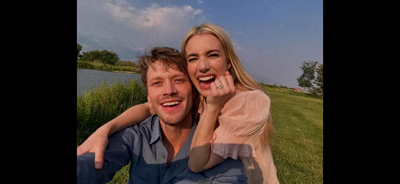 Actress Emma Roberts shows off a big diamond ring while revealing she is engaged to Cody John.
