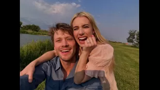 Actress Emma Roberts shows off a big diamond ring while revealing she is engaged to Cody John.