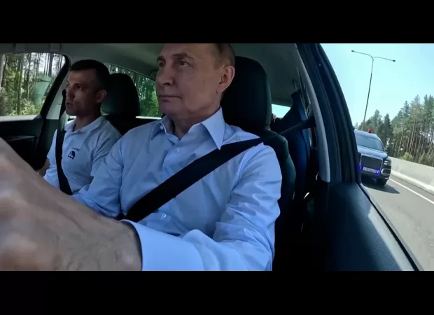 Putin risked his safety by driving a Lada without a bulletproof vest, following Trump's close call.