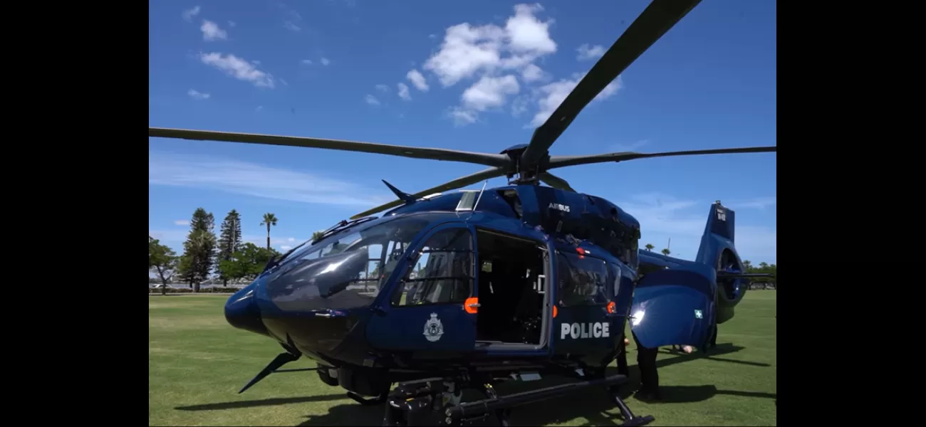 Man detained after police helicopter struck by laser beam