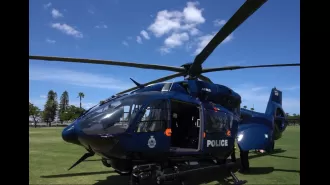 Man detained after police helicopter struck by laser beam