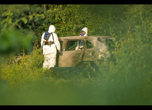 The bodies of two British men were discovered in a burned car in Sweden, the result of an apparent targeted attack by a criminal organization.