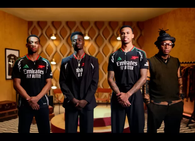 Arsenal's new away kit features a color combination of black, red, and green.