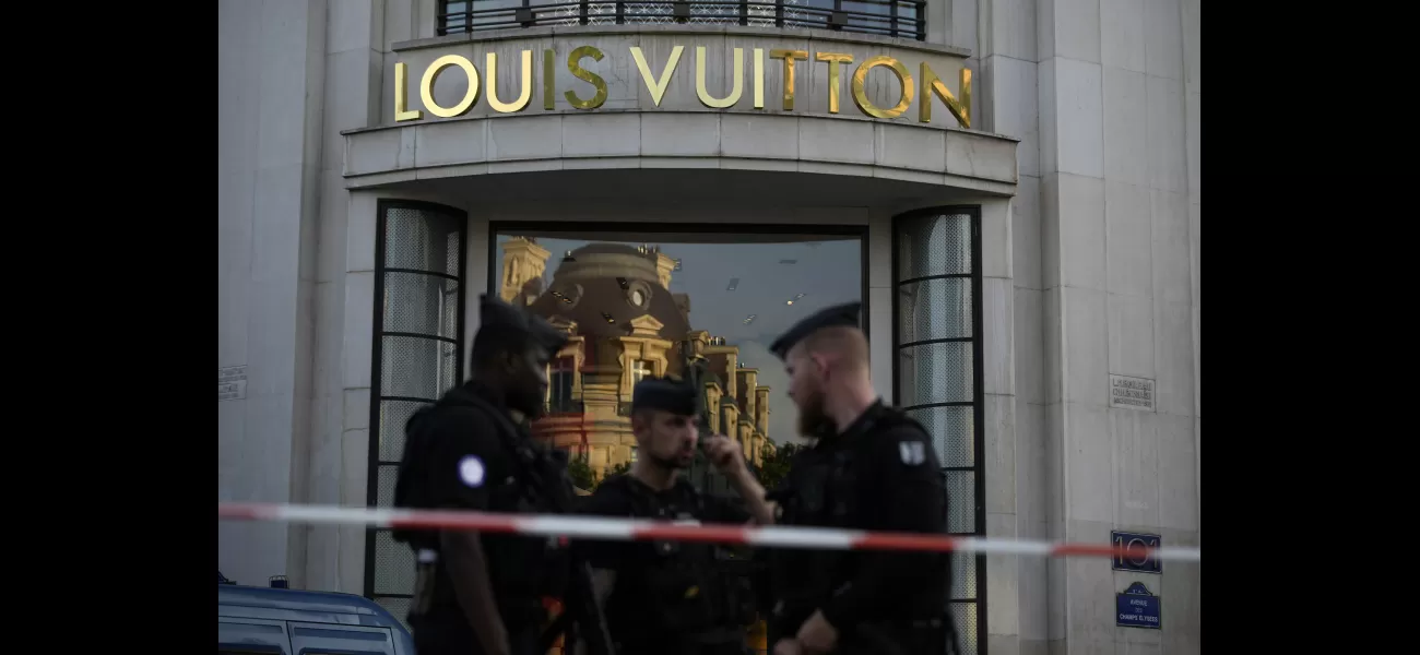 A police officer was stabbed and the attacker was killed in central Paris.