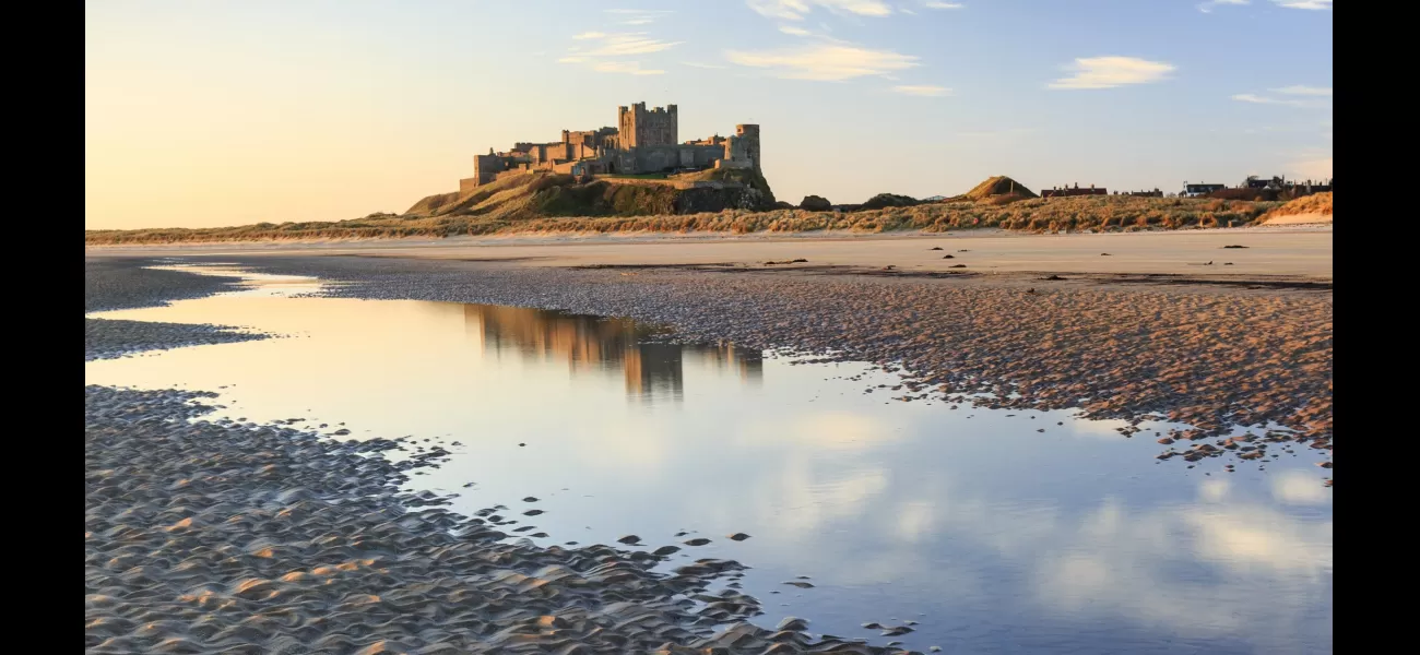 Bamburgh, a peaceful village, is considered the top seaside spot in the UK.