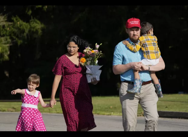 Large crowd pays tribute to former fire chief who died at Trump event.