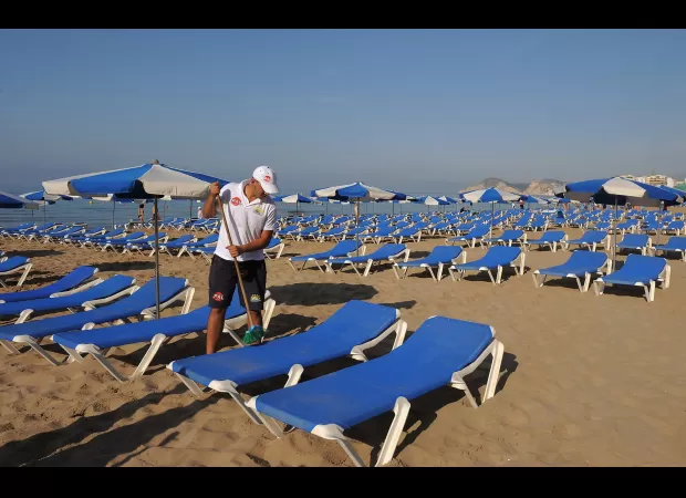 A popular vacation destination in Spain is charging visitors €250 if they reserve sun loungers.