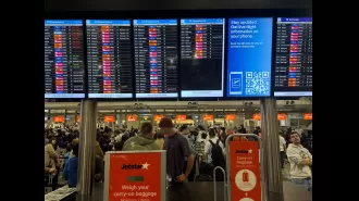 Australia travelers face flight delays as airlines and airports recover from worldwide IT system failure.