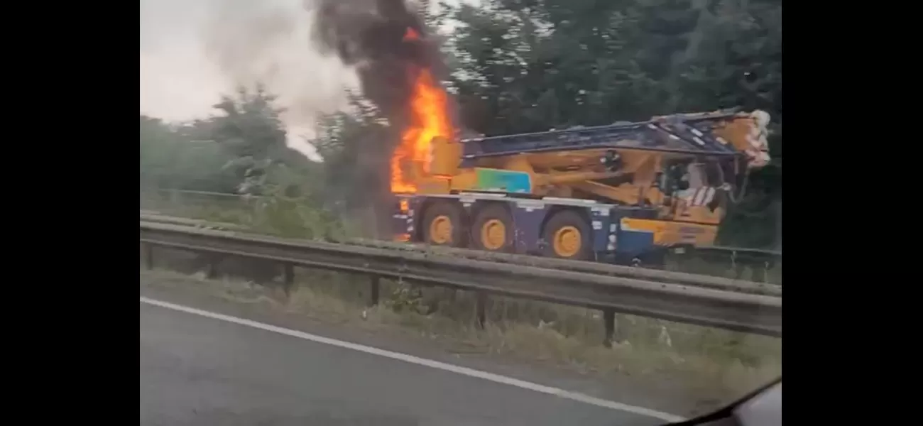 Traffic chaos as A38 shut down due to burning crane.