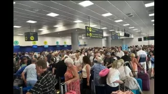 Flights cancelled due to IT issue, leaving passengers stuck for 50 hours at airport.