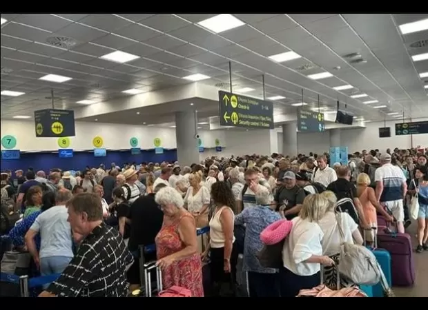 Flights cancelled due to IT issue, leaving passengers stuck for 50 hours at airport.