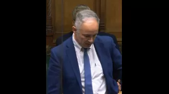Politician overcomes emotions while recalling loss of parents during heartfelt debut speech.