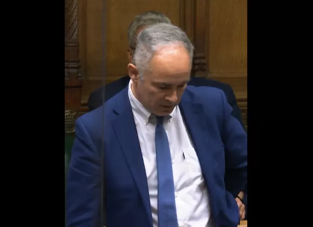 Politician overcomes emotions while recalling loss of parents during heartfelt debut speech.