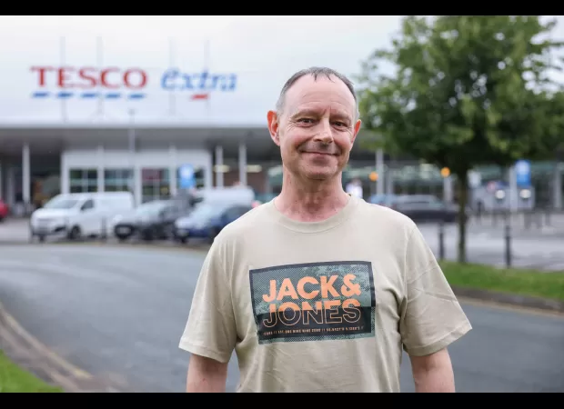 A man searches for his helpful Tesco employee.