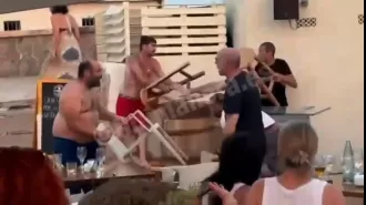 People without shirts threw furniture at employees during an altercation at a beach club in Majorca.