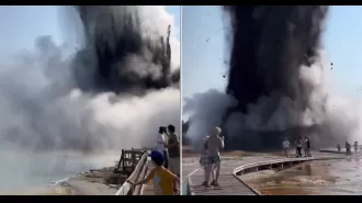Tourists flee as 'super volcano' erupts at Yellowstone National Park.