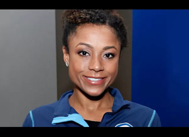 Dominique Dawes, an Olympic athlete, will not let her kids go through the same struggles she faced in gymnastics.