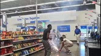 Streamer sets off firework in store, causing chaos.