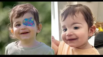 A young child gets new tiny artificial eye after losing one to a tumor.