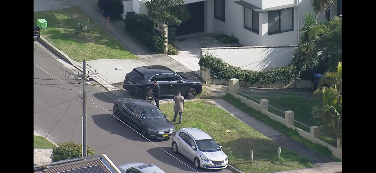 Two people fought police officers after reportedly being discovered with firearms on a street in Sydney.