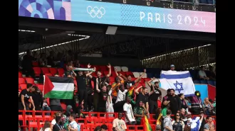 Israel's national anthem was met with boos and clashes between fans during an Olympic football match.