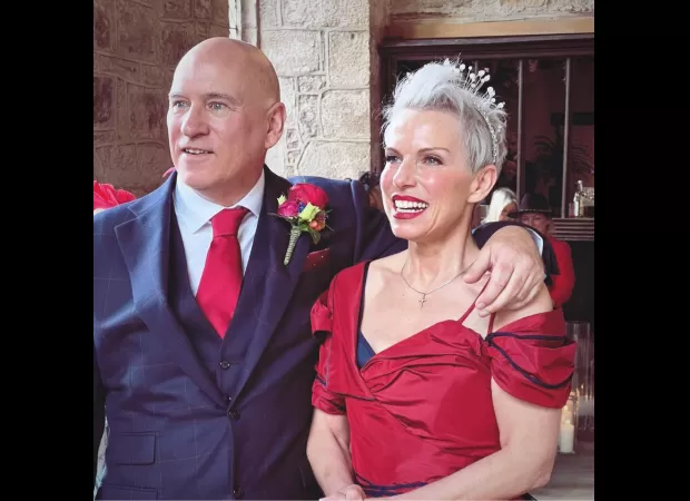 Actress Sue Devaney marries BBC journalist in a low-key wedding, looking radiant as ever from her time on Coronation Street.