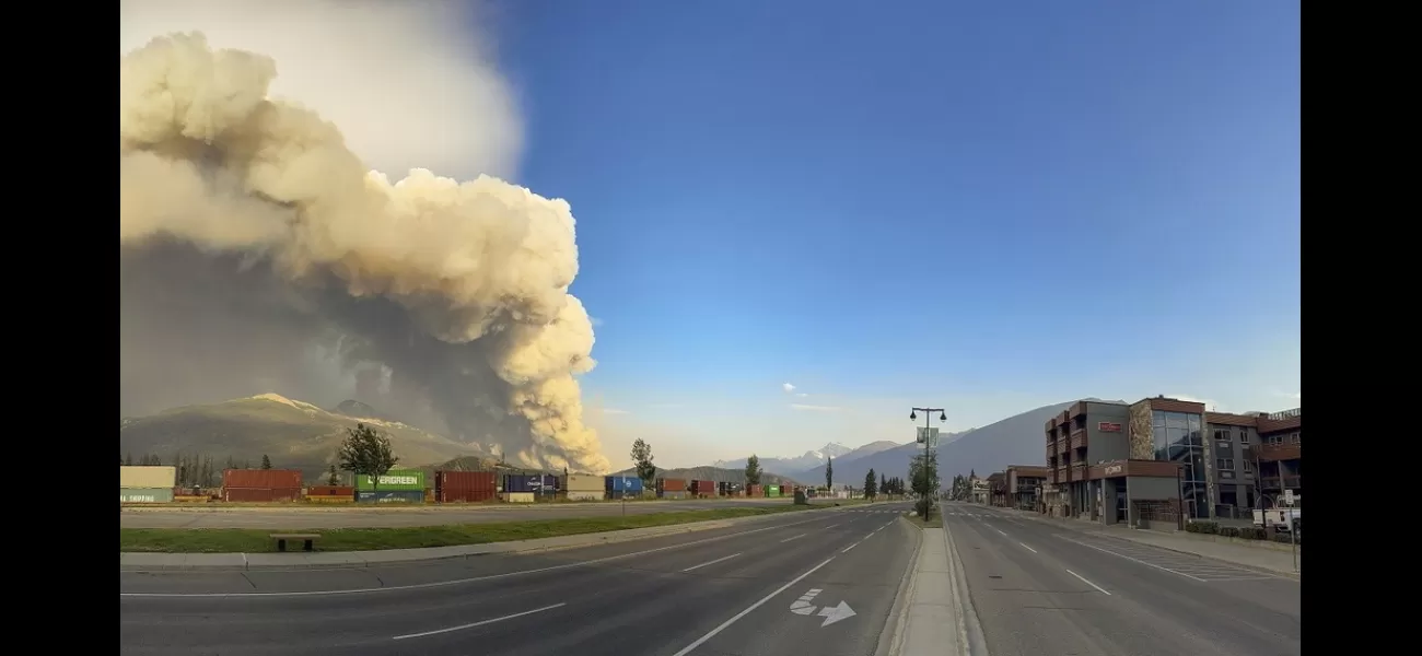 Canada's popular tourist destination is in flames as a swift wildfire tears through the town.