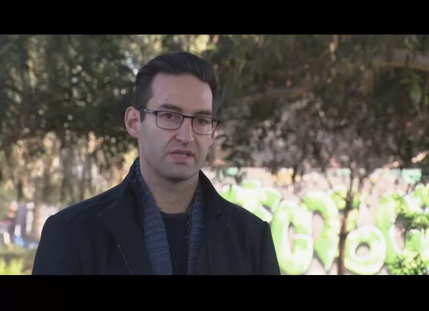 Two teenagers accused of damaging a politician's office building are facing charges.