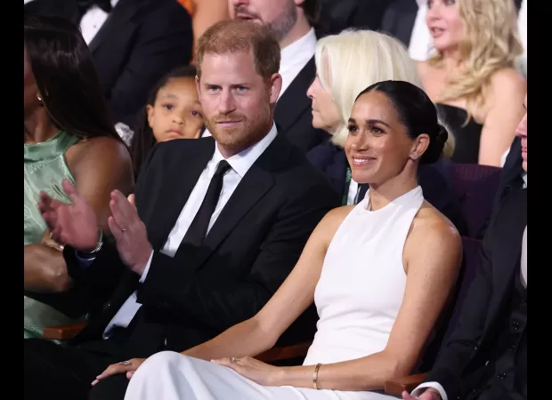Prince Harry explains why he's not bringing Meghan back to the UK.