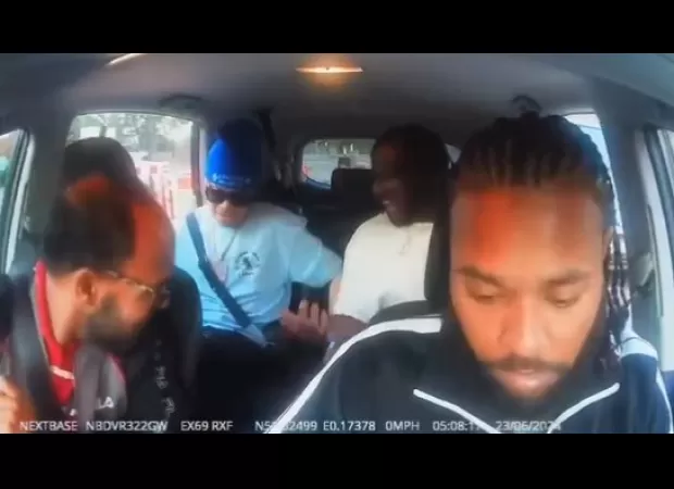 Scary scene as group of masked attackers attempt to stab taxi rider with machetes.