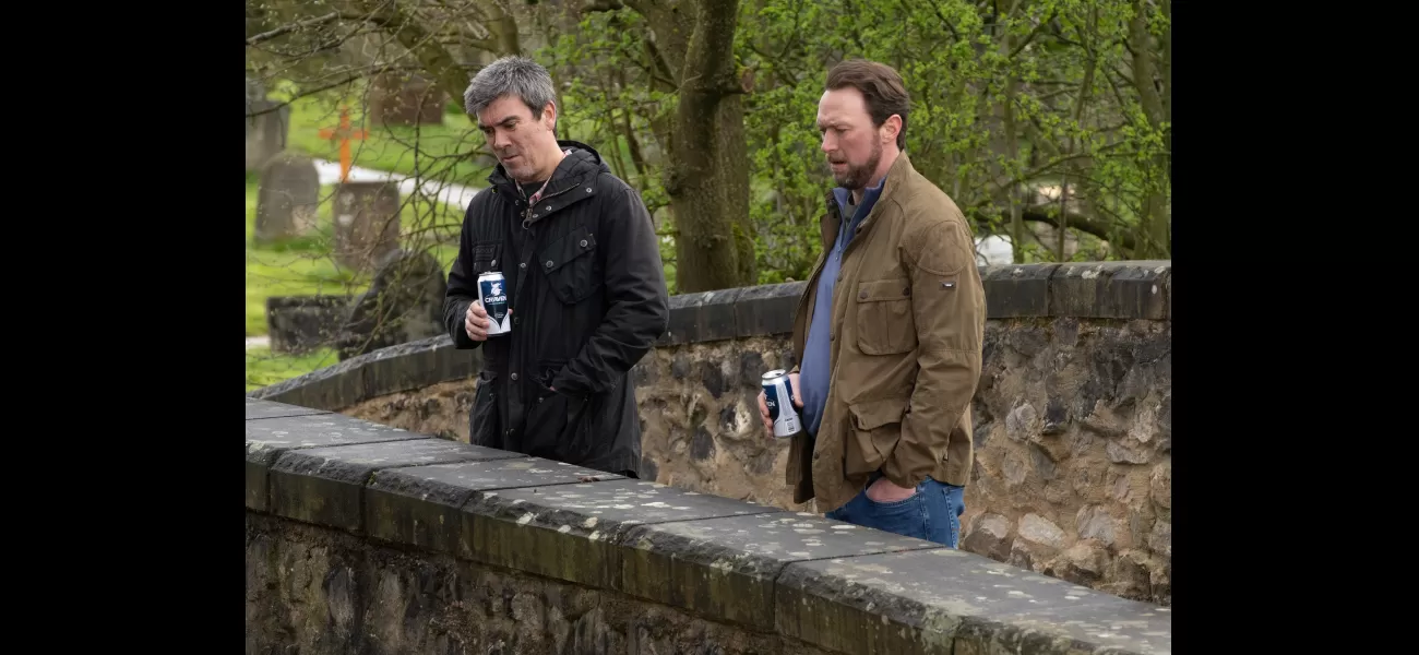 Cain helps a struggling resident in Emmerdale.