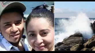 A pregnant woman posing for a picture with her fiancé was pulled into the ocean by an unexpected large wave.