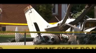 Plane crashes in front yard of home, causing terror.