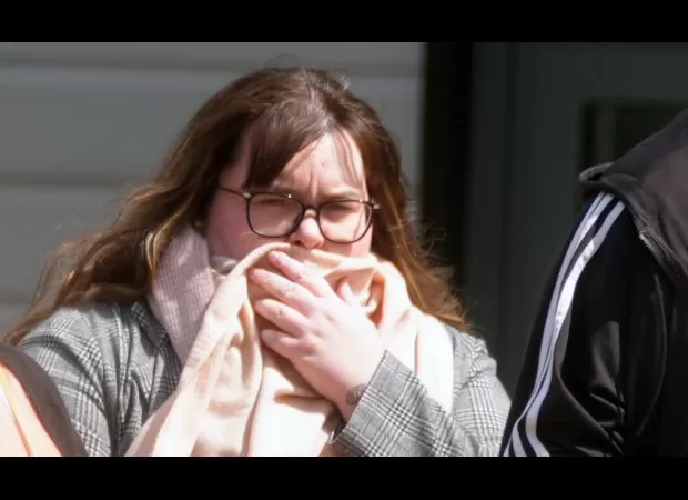 A prison guard cries in court after confessing to having an improper relationship with a prisoner.