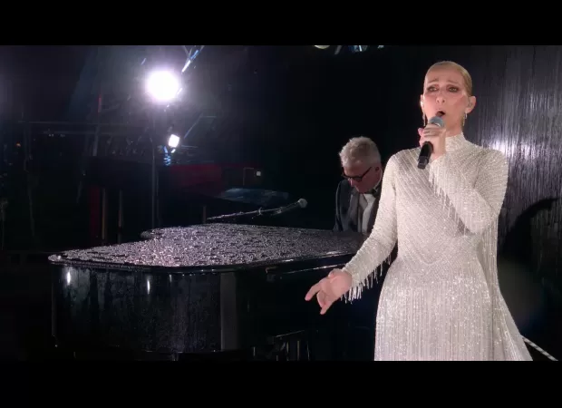 Celine Dion impresses fans with inspiring performance at Paris Olympics under Eiffel Tower.