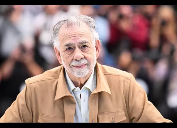 A video of director Francis Ford Coppola kissing extras surfaces after he denies being inappropriate.