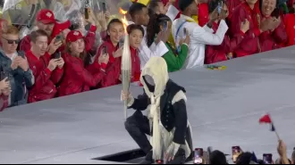 The identity of the mystery Olympic torchbearer, who wore a mask during the relay, was revealed in an Instagram post that has since been deleted.