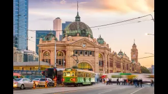 Police detain man after neo-Nazis in masks invade Melbourne's central business district.