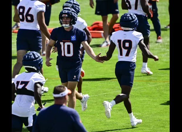 Broncos QB Bo Nix shows resilience at training camp despite making critical error.