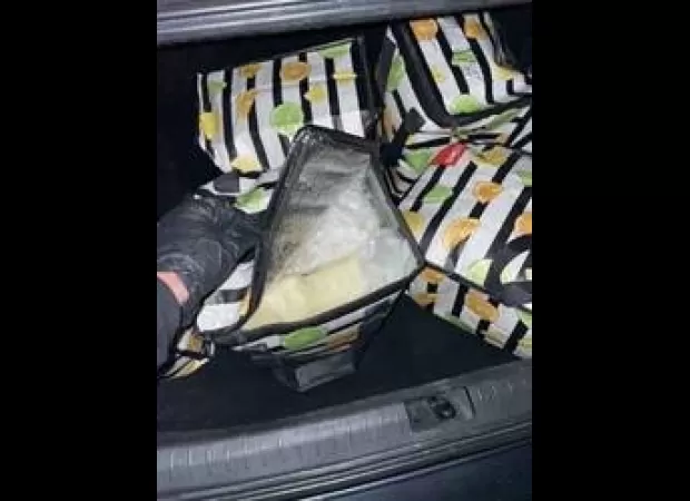 Police found 60 kilos of meth in a car trunk and charged the driver.