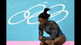 Simone Biles injured during Olympics comeback in Paris.
