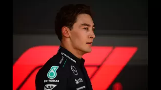 George Russell apologizes for mistake that caused him to be disqualified from Formula One race.